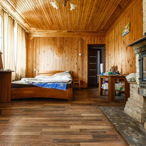 Cabin style home in San Diego with wood flooring and walls