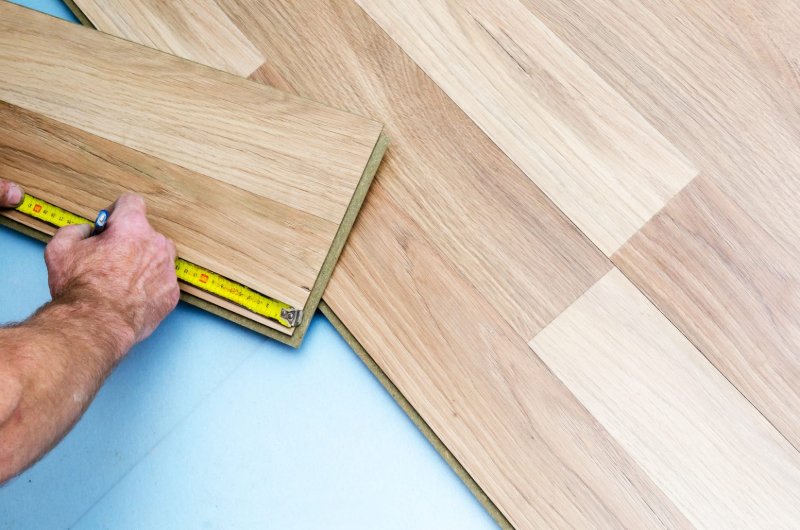 Measuring Hardwood flooring during installation
