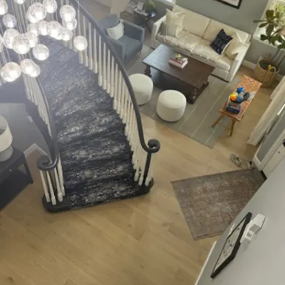 Open concept living room with light hardwood flooring