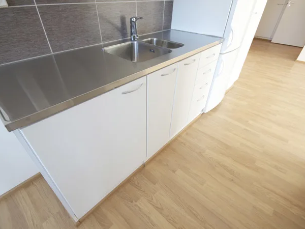 Hardwood flooring in a compact kitchen