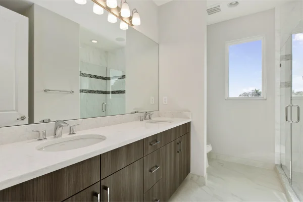 Marble look LVT flooring in a modern bathroom